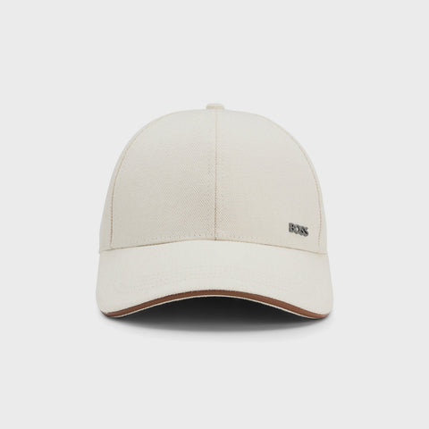 Gorra BOSS de algodón con ribete de cuero